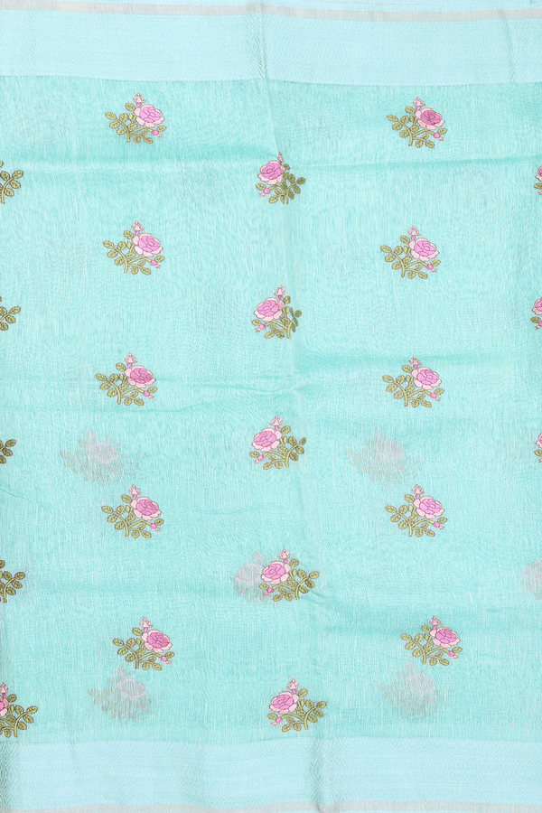 Linen Saree In Sea Green With Floral Embroidered Buttas