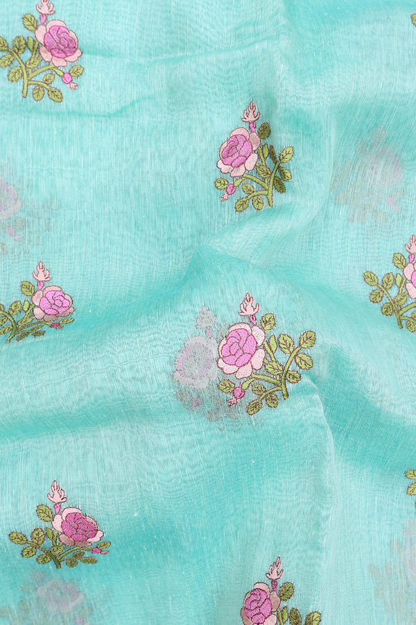 Linen Saree In Sea Green With Floral Embroidered Buttas