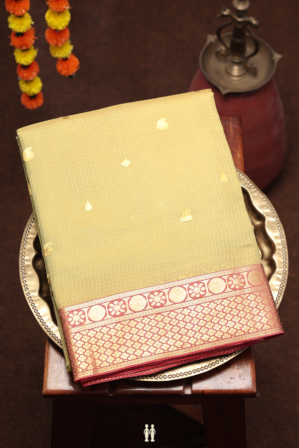 Kota Silk Saree In Cardamom Green With Zari Buttas