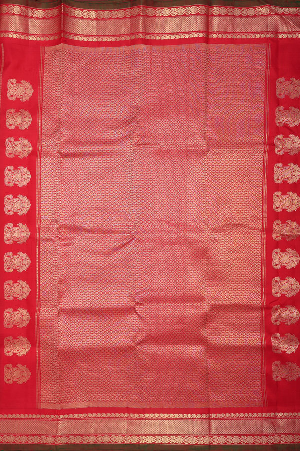 Gadwal Silk Saree In Emerald Green With Floral Buttas