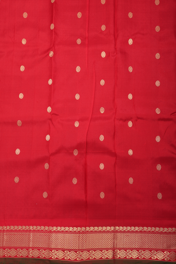 Gadwal Silk Saree In Emerald Green With Floral Buttas