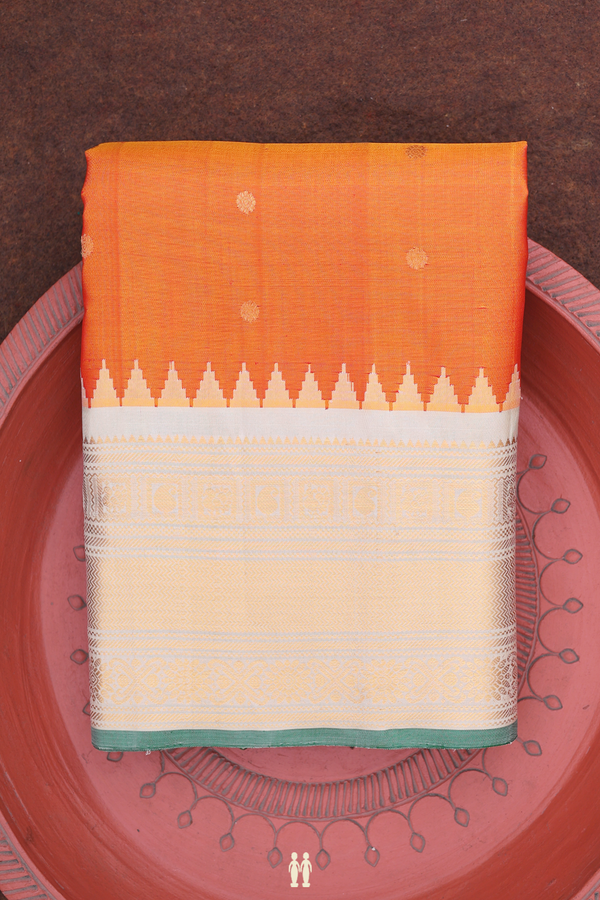 Gadwal Silk Saree In Royal Orange With Floral Buttas
