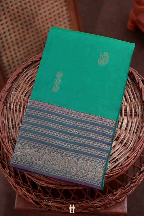 Kanchipuram Silk Saree In Green With Peacock Buttas