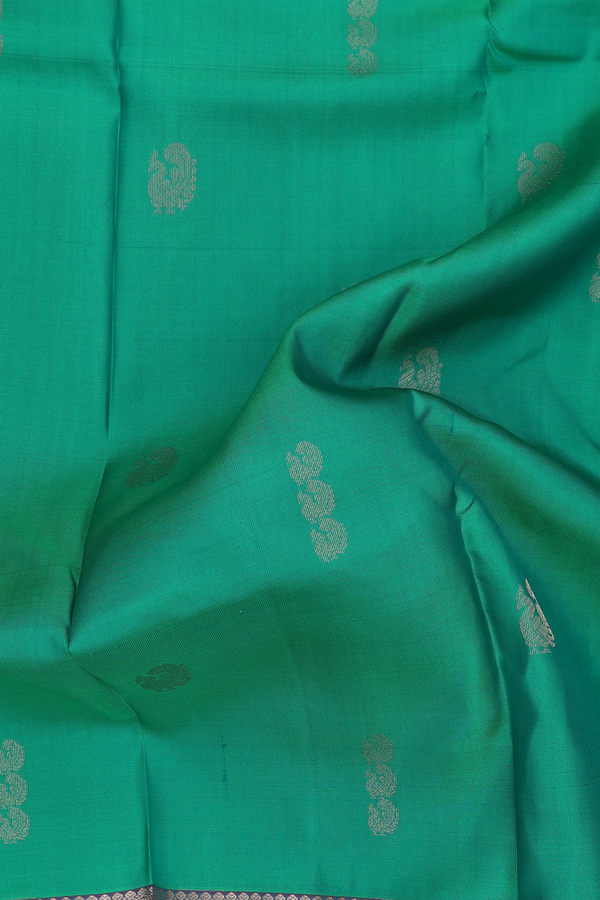 Kanchipuram Silk Saree In Green With Peacock Buttas