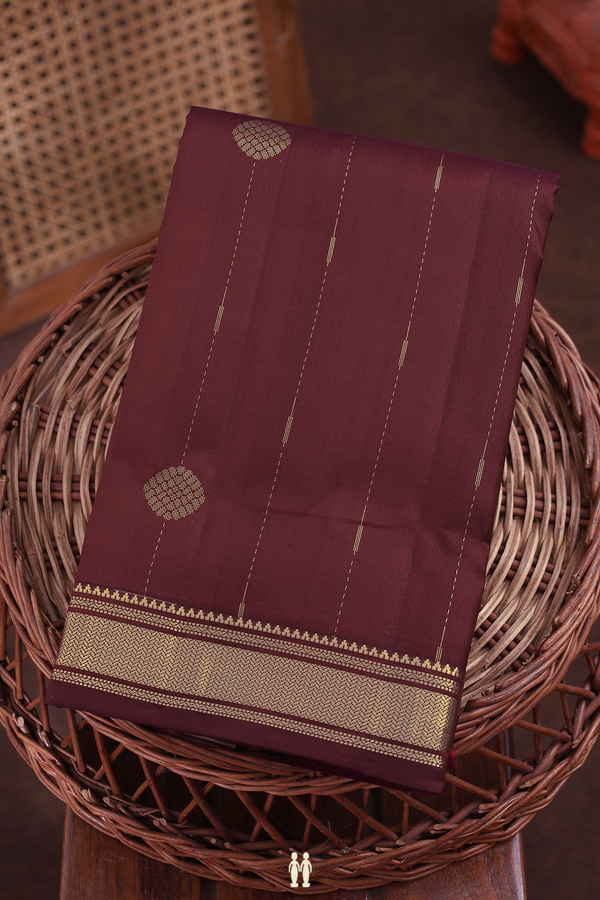 Kanchipuram Silk Saree In Maroon Along Stripes With Buttas