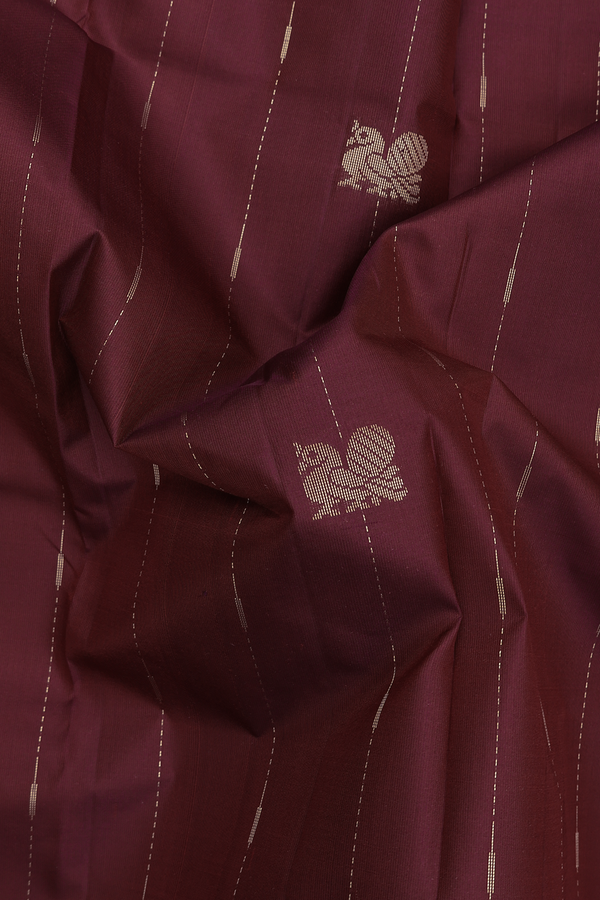 Kanchipuram Silk Saree In Maroon Along Stripes With Buttas
