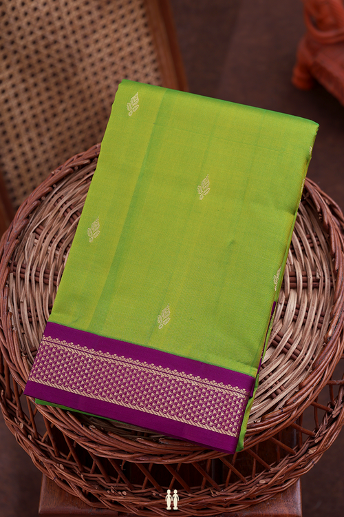 Kanchipuram Silk Saree In Parrot Green With Zari Buttas