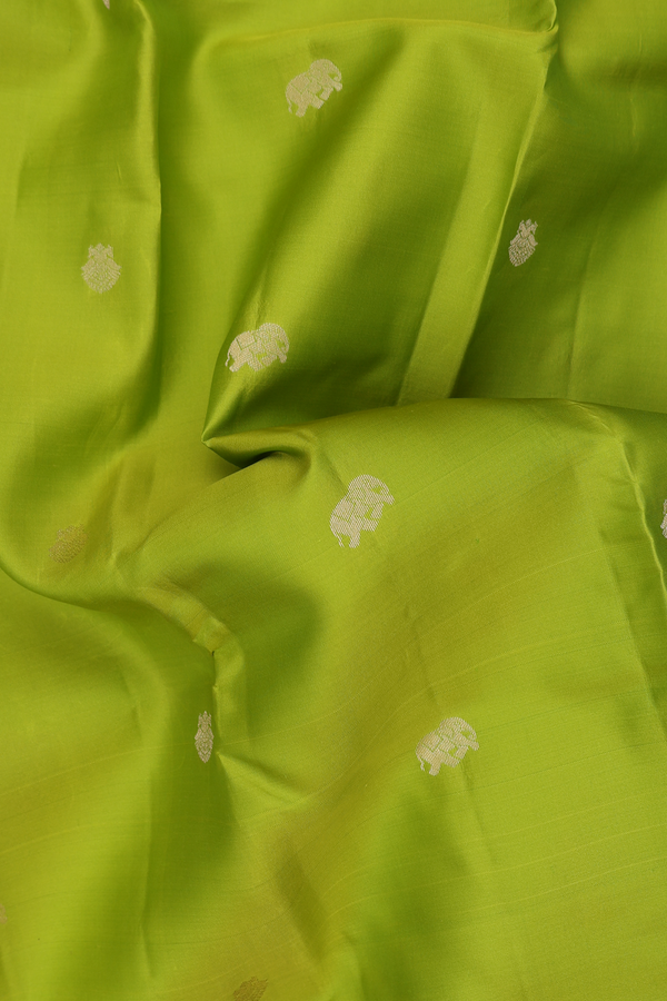 Kanchipuram Silk Saree In Lime Green With Elephant Buttas