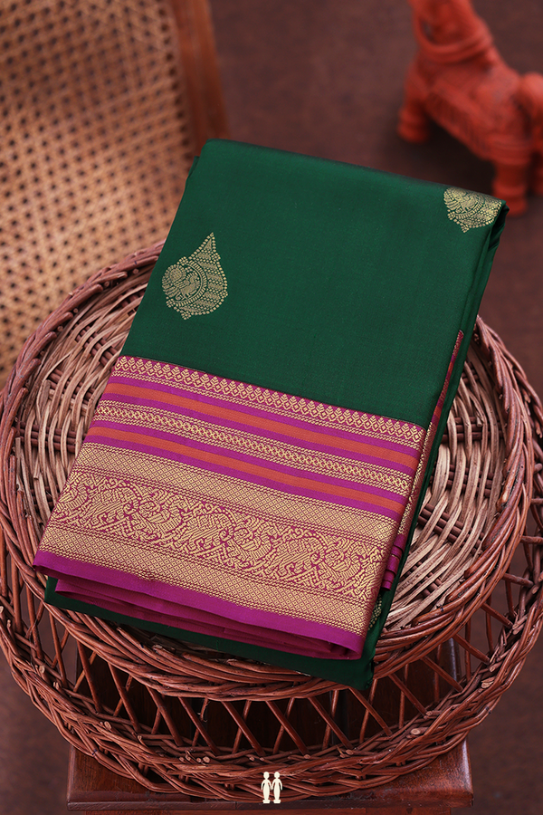 Kanchipuram Silk Saree In Forest Green With Peacock Buttas