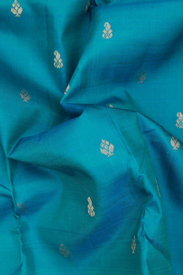 Kanchipuram Silk Saree In Teal Blue With Zari Buttas