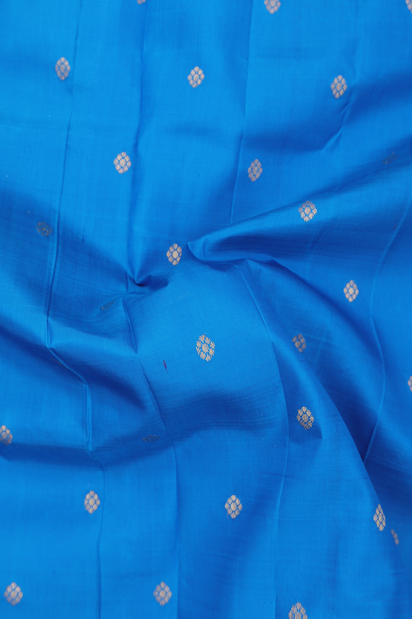Kanchipuram Silk Saree In Cerulean Blue With Zari Buttas