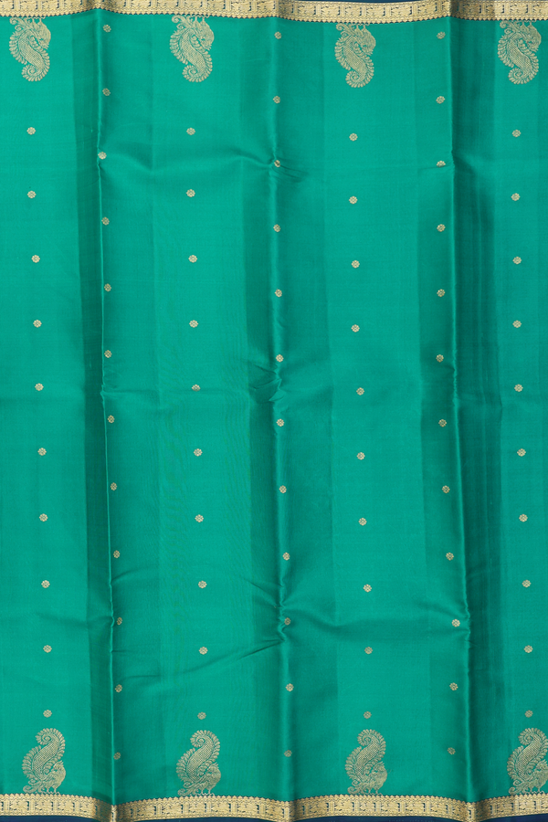 Kanchipuram Silk Saree In Emerald Green With Floral Buttis