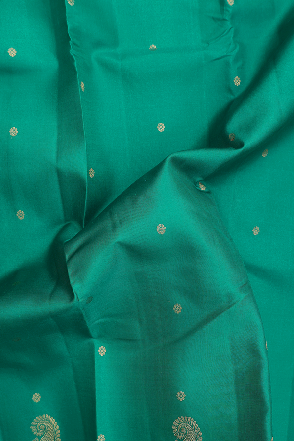 Kanchipuram Silk Saree In Emerald Green With Floral Buttis