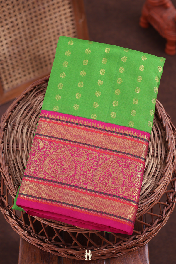 Kanchipuram Silk Saree In Leaf Green With Floral Buttas