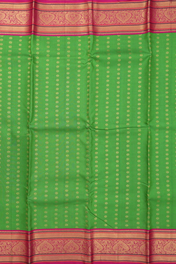 Kanchipuram Silk Saree In Leaf Green With Floral Buttas