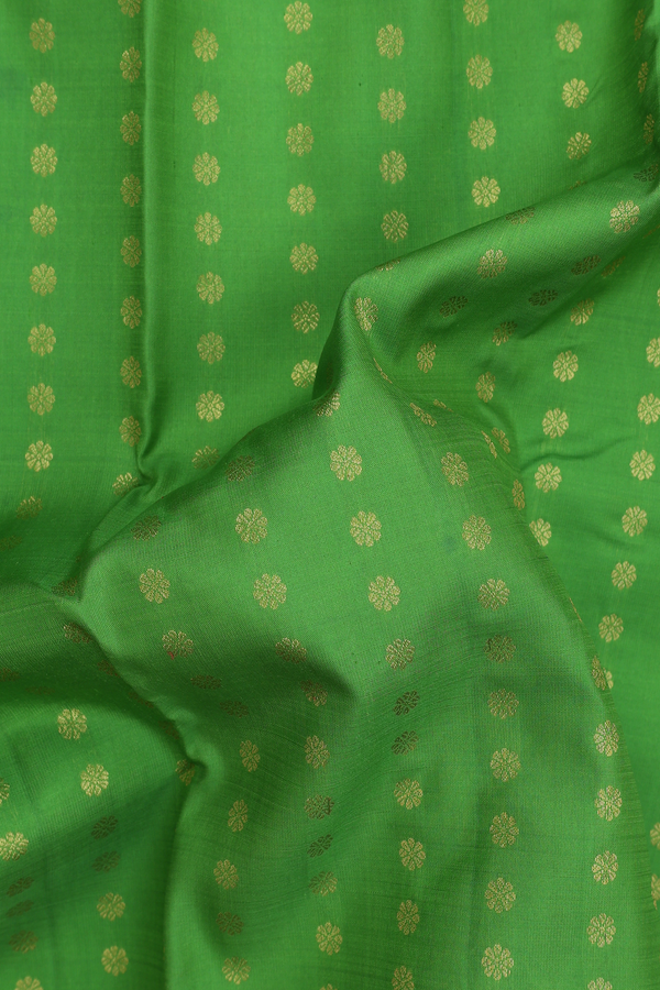 Kanchipuram Silk Saree In Leaf Green With Floral Buttas