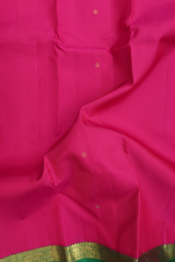 Kanchipuram Silk Saree In Rani Pink With Floral Buttas