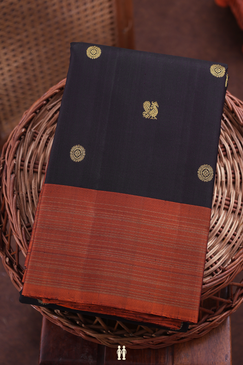 Kanchipuram Silk Saree In Black With Peacock Chakram Buttas