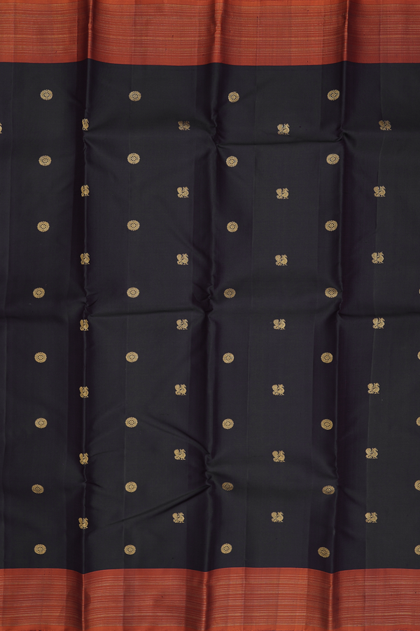 Kanchipuram Silk Saree In Black With Peacock Chakram Buttas