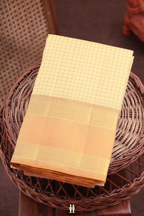 Kanchipuram Silk Saree In Cream Color With Checks Design