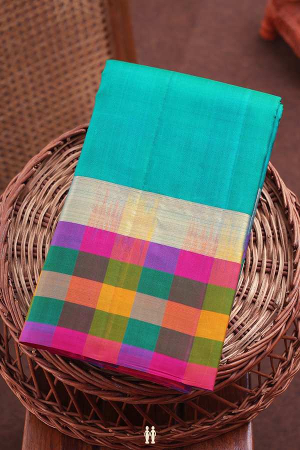 Kanchipuram Silk Saree In Teal Blue With Checks Border