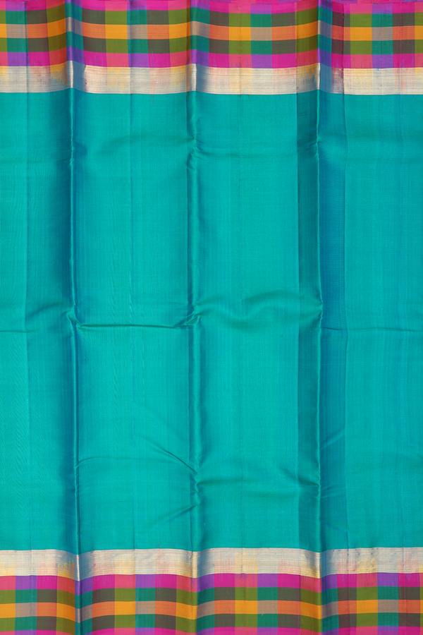 Kanchipuram Silk Saree In Teal Blue With Checks Border