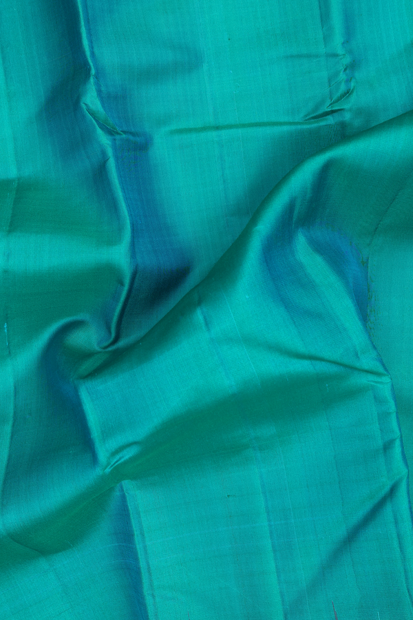 Kanchipuram Silk Saree In Teal Blue With Checks Border