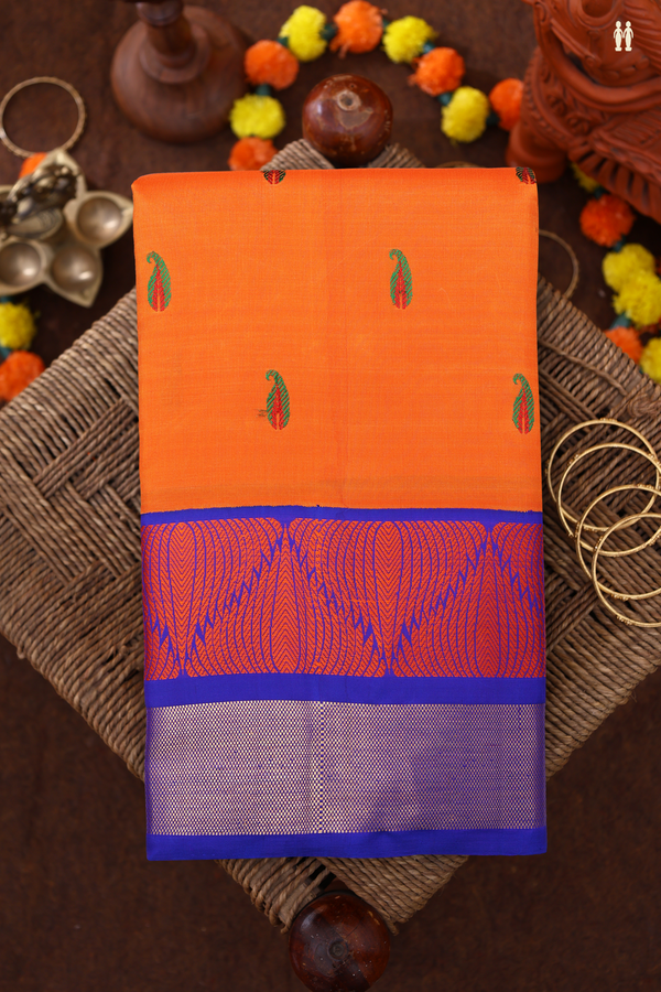 Kanchipuram Silk Saree In Orange With Paisley Buttas