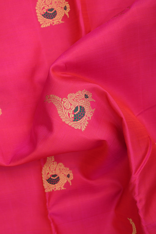 Kanchipuram Silk Saree In Rani Pink With Peacock Buttas