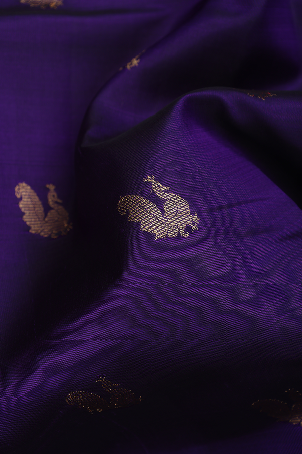 Kanchipuram Silk Saree In Regal Purple With Peacock Buttas