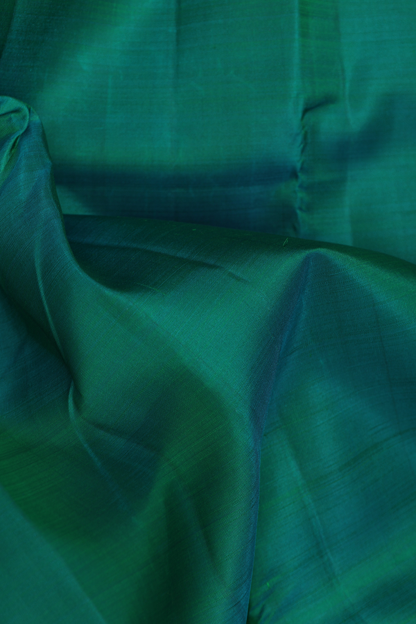Kanchipuram Silk Saree In Emerald Green With Zari Border