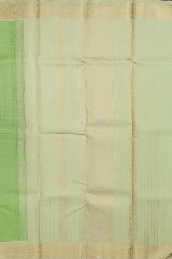 Kanchipuram Silk Saree In Pastel Green With Zari Buttas