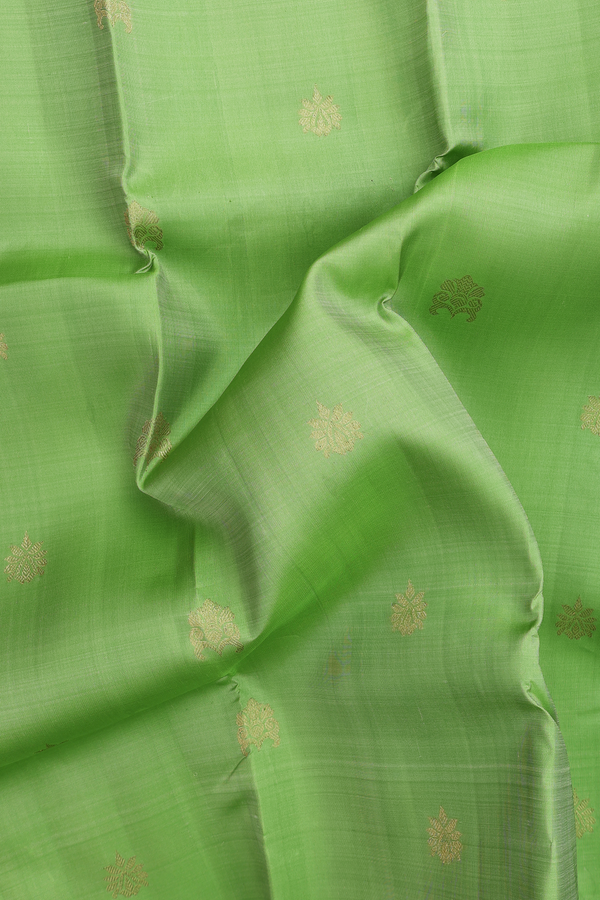 Kanchipuram Silk Saree In Pastel Green With Zari Buttas