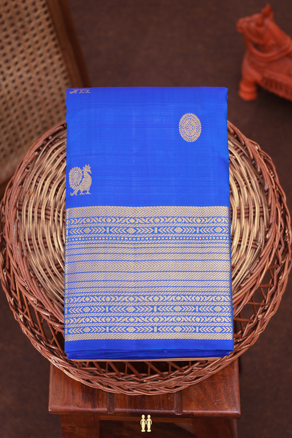 Kanchipuram Silk Saree In Indigo Blue With Peacock Buttas