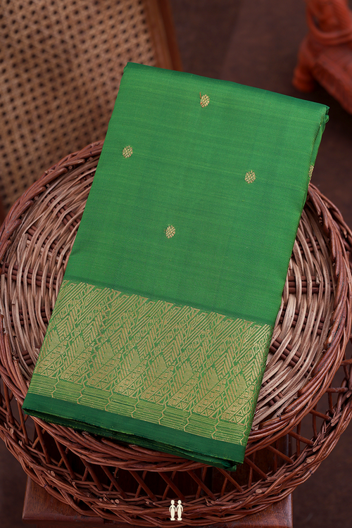 Kanchipuram Silk Saree In Leaf Green With Zari Buttas