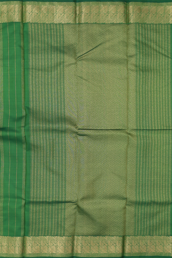 Kanchipuram Silk Saree In Leaf Green With Zari Buttas