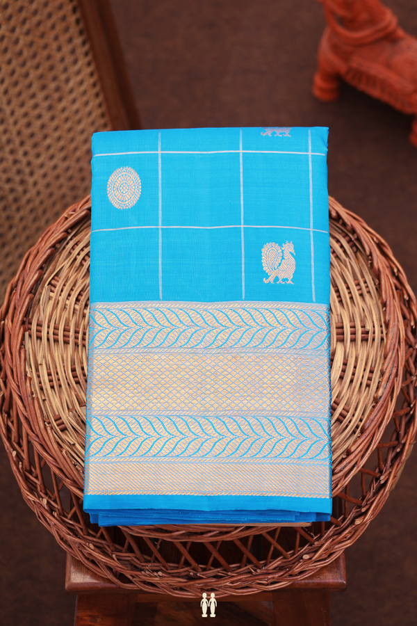Kanchipuram Silk Saree In Blue Along Checks With Buttas