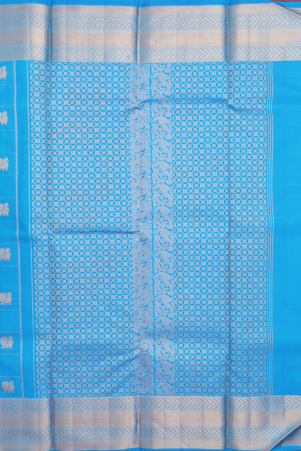 Kanchipuram Silk Saree In Blue Along Checks With Buttas