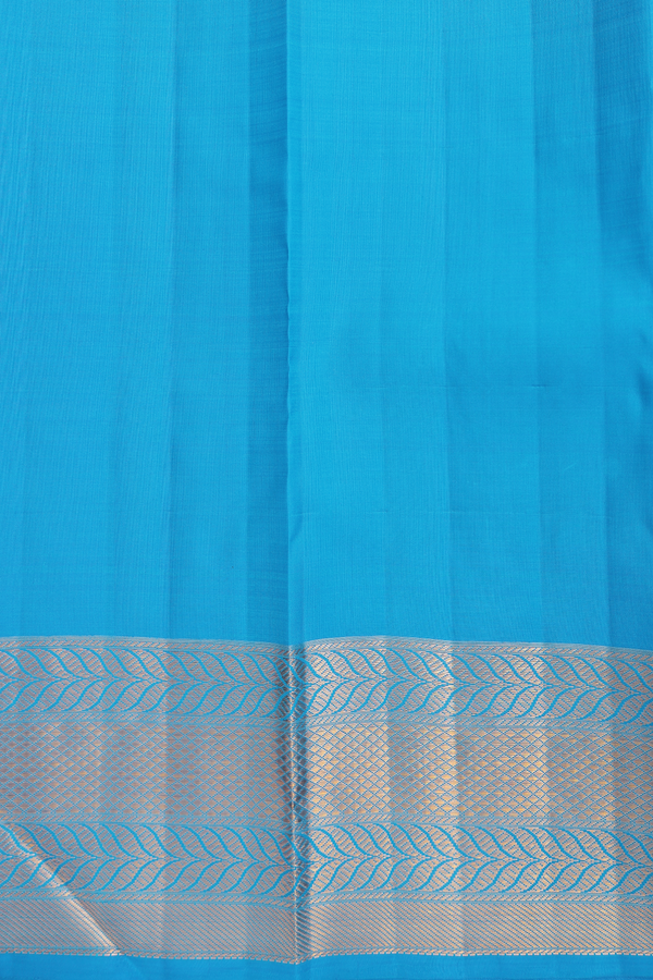 Kanchipuram Silk Saree In Blue Along Checks With Buttas