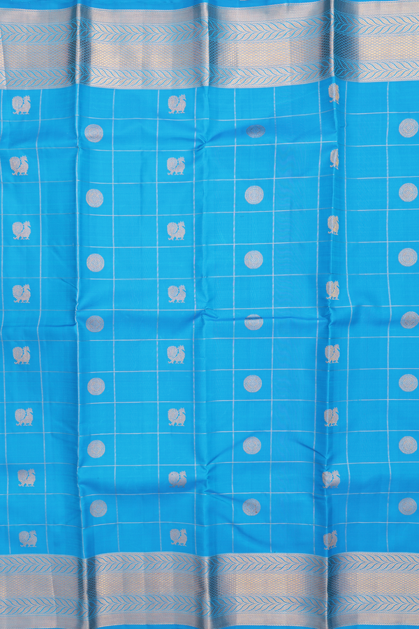 Kanchipuram Silk Saree In Blue Along Checks With Buttas