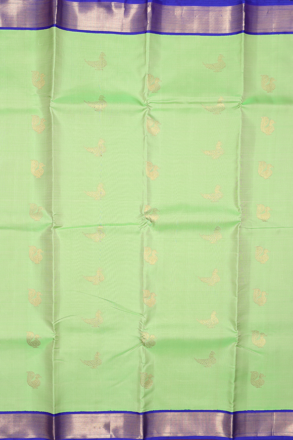 Kanchipuram Silk Saree In Pastel Green With Peacock Buttas