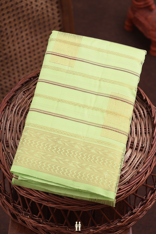 Kanchipuram Silk Saree In Pale Green With Stripes Along Motifs