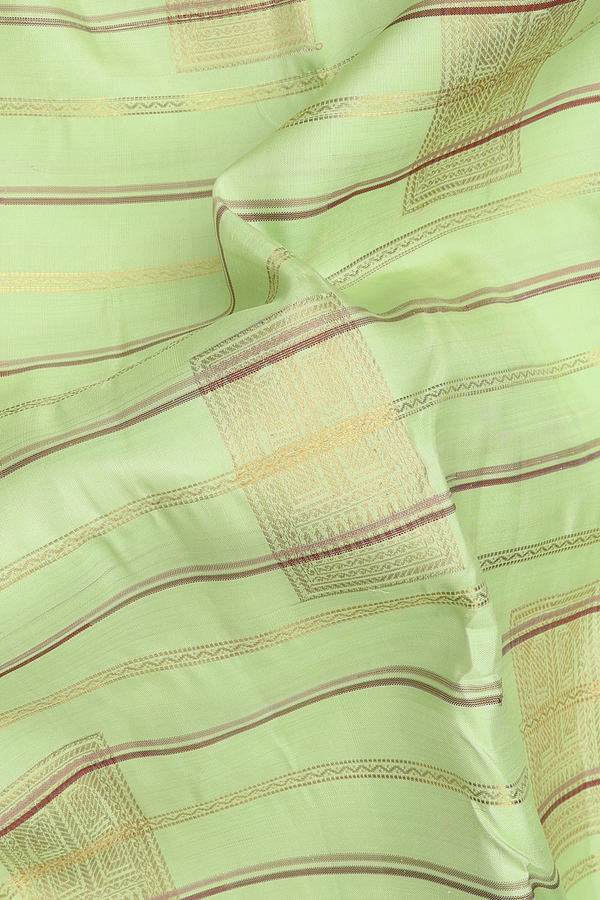 Kanchipuram Silk Saree In Pale Green With Stripes Along Motifs