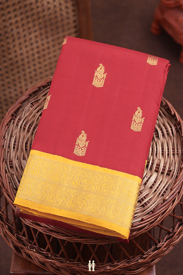 Kanchipuram Silk Saree In Crimson Red With Zari Buttas
