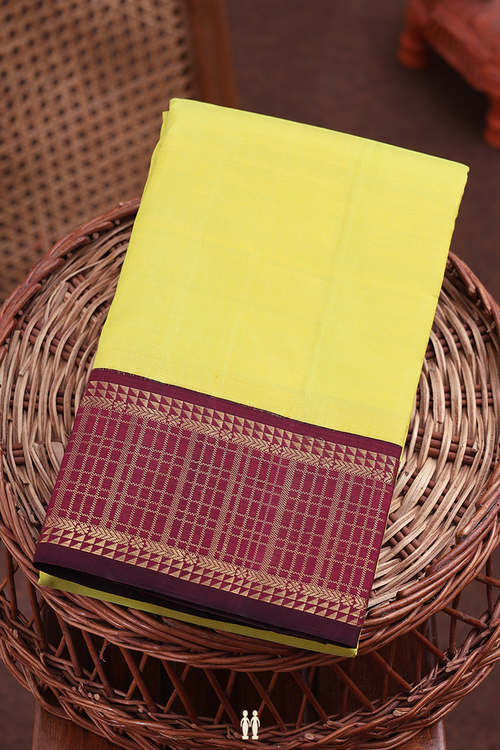Kanchipuram Silk Saree In Lemon Yellow With Korvai Border