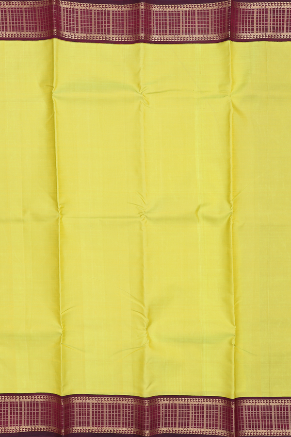 Kanchipuram Silk Saree In Lemon Yellow With Korvai Border