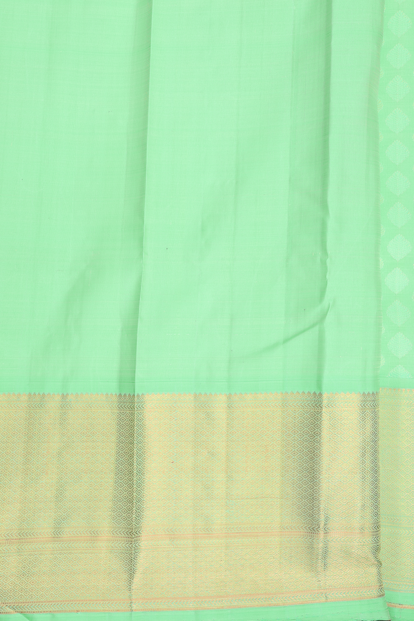 Kanchipuram Silk Saree In Light Green With Threadwork Buttas