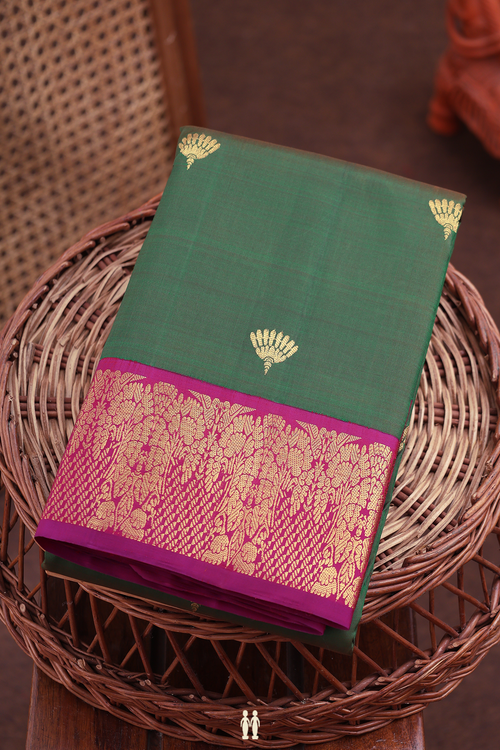 Kanchipuram Silk Saree In Leaf Green With Floral Buttas