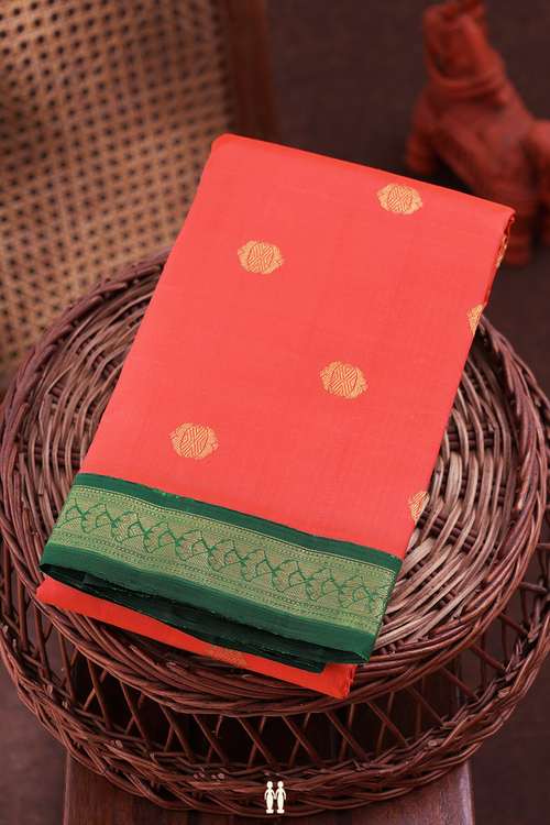 Kanchipuram Silk Saree In Coral Orange With Zari Buttas