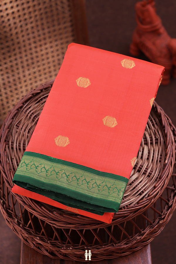 Kanchipuram Silk Saree In Coral Orange With Zari Buttas
